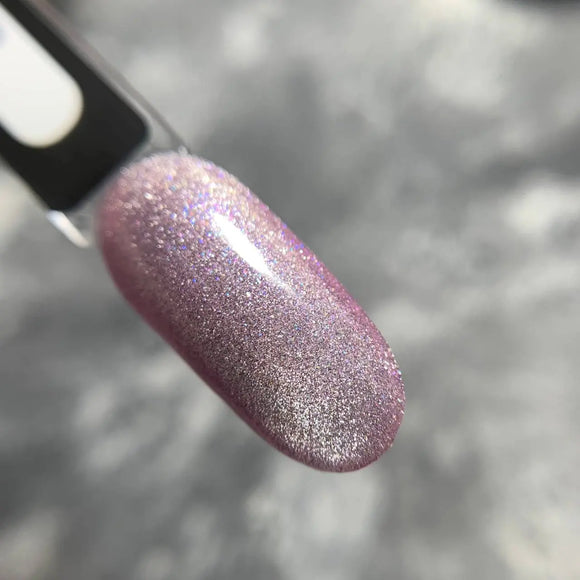 Saga Cat Eye Shine nº03 Violet Blush con brillo azul neón 9ml